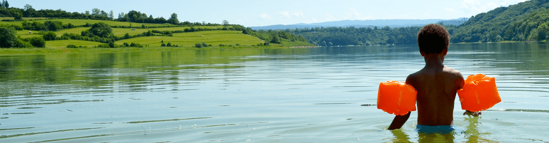 Kinderen in de Jura: het meer van Vouglans